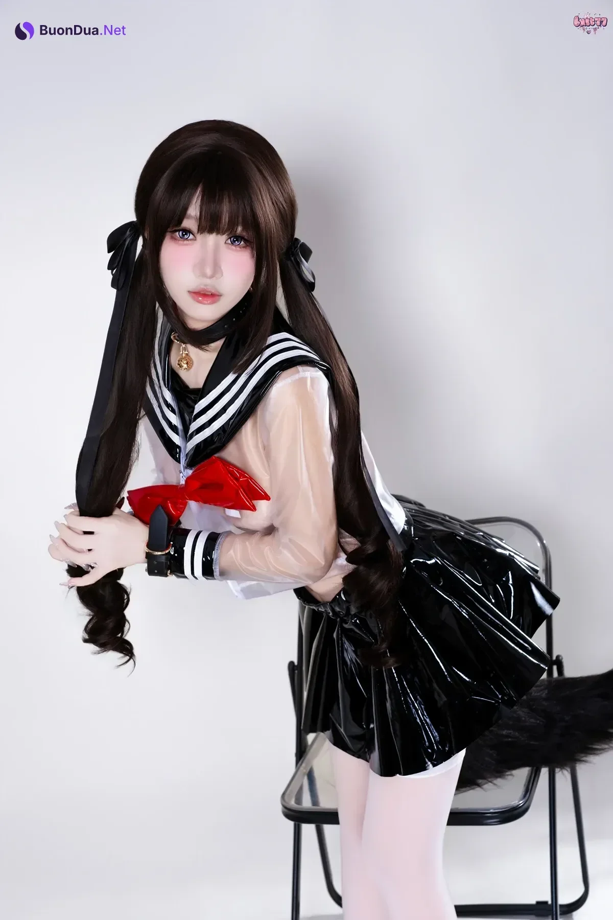 Cosplay 柒柒要乖哦 – 兽尾透明JK - Photo 2